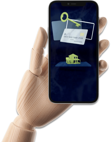 A wooden hand holding a phone